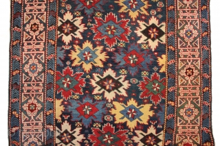 A classic Shirvan "field of flowers" runner with rebound sides and a few small areas of reweaving with original macrame ends. Kufic border. Dated 1844. 105 x 344 cm ( 3'5" x  ...