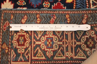 A classic Shirvan "field of flowers" runner with rebound sides and a few small areas of reweaving with original macrame ends. Kufic border. Dated 1844. 105 x 344 cm ( 3'5" x  ...