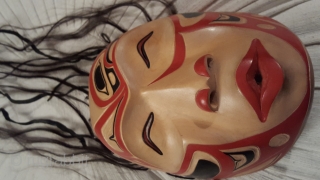Wonderful NordWestCoast-Indians ( British Columbia/Canada) mask made of wood and original human hair with beautiful symbolic decorations in red and black.
Picture of carver with this mask in the hand ,fixed in the  ...