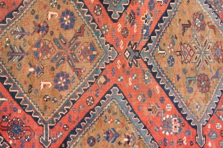 Early pre-confederation Khamseh with Camel ground on hand twined cotton warps (165x78 cm). Some older repairs, and some parts of the sides are missing. Highly collectible early example of the type.  