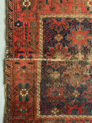 Balouch antique small mat cut and to be rejoined. The rug is cut in half but actually still connected by the selvedge warps along one side. This proves it is complete

People do  ...