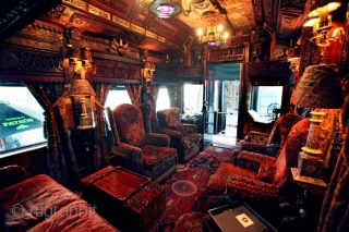 This is part of the interior of a 1927 private rail car that now belongs to the zillionaire who owns Patron taquila. (you can google it)
Check the wall-to-wall Serapi!    