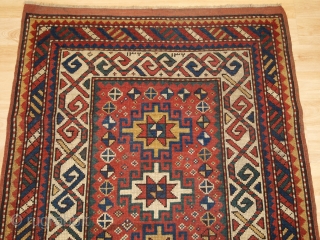 Antique Caucasian Kazak rug of small size with four Memlinc guls. www.knightsantiques.co.uk 

Size: 5ft 2in x 2ft 11in (158 x 90cm)

Circa 1900.

A sweet small Kazak rug with a single vertical row of  ...