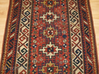 Antique Caucasian Kazak rug of small size with four Memlinc guls. www.knightsantiques.co.uk 

Size: 5ft 2in x 2ft 11in (158 x 90cm)

Circa 1900.

A sweet small Kazak rug with a single vertical row of  ...