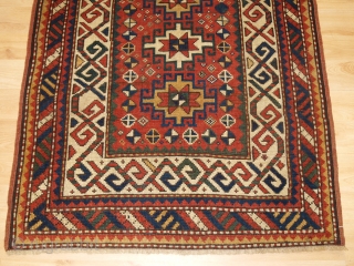 Antique Caucasian Kazak rug of small size with four Memlinc guls. www.knightsantiques.co.uk 

Size: 5ft 2in x 2ft 11in (158 x 90cm)

Circa 1900.

A sweet small Kazak rug with a single vertical row of  ...