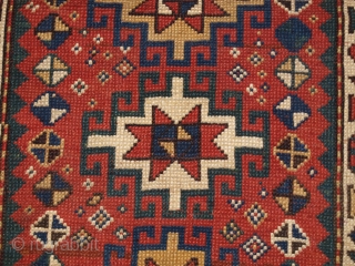 Antique Caucasian Kazak rug of small size with four Memlinc guls. www.knightsantiques.co.uk 

Size: 5ft 2in x 2ft 11in (158 x 90cm)

Circa 1900.

A sweet small Kazak rug with a single vertical row of  ...