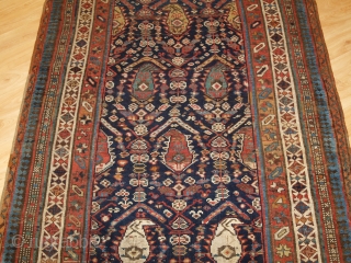 Antique South Caucasian Kurdish or Shahsavan runner, with all over boteh and shrub design. www.knightsantiques.co.uk 

Size: 12ft 11in x 3ft 11in (394 x 120cm). 

Circa 1880.

The indigo field is filled with large  ...