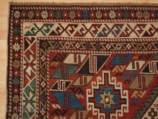 Antique Caucasian Daghestan rug with two diamond medallions on a soft terracotta red ground. www.knightsantiques.co.uk 

Size: 5ft 10in x 4ft 0in (178 x 123cm).

Circa 1890.

An excellent Daghestan rug with two large central  ...