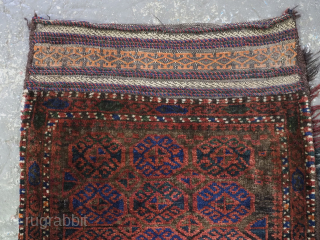 Antique Afghan Baluch storage or grain bag; these are known as ‘balisht’.
Size: 3ft 5in x 1ft 10in (105 x 56cm).
Circa 1920.

This example has a repeat octagon design to the face with a  ...