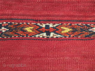 Antique Tekke Turkmen 'Kizil' chuval with a traditional banded design in mixed techniques.
Size: 4ft 3in x 2ft 8in (130 x 81cm).
Circa 1880.
Chuval are storage bags used by the Turkmen nomads for the ...