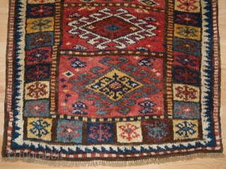 Antique North West Persian Kurdish yastik with excellent colour and traditional design. www.knightsantiques.co.uk Size: 2ft 11in x 2ft 3in (90 x 69cm). 

Circa 1900.

Yastik are small piled rugs that were used as  ...