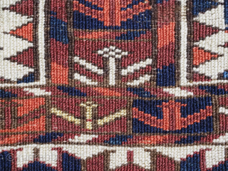Size: 2ft 2in x 10in (65 x 25cm).

Antique Tekke Turkmen 'kap' or mafrash, small storage bag face.

Circa 1850.

An outstanding example of a Tekke kap, with the three panel tree design. The face  ...