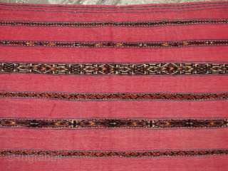 Size: 4ft 1in x 2ft 6in (124 x 76cm).
Antique Tekke Turkmen 'Kizil' chuval face with a traditional banded design in mixed techniques.
Circa 1880.
Chuval are storage bags used by the Turkmen nomads for ...