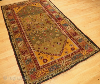 Antique Western Anatolian Milas rug of scarce design with superb soft wool and wonderful green ground. www.knightsantiques.co.uk 
Size: 6ft 11in x 4ft 4in (212 x 132cm). 
Circa 1875. 

This beautiful rug belongs  ...