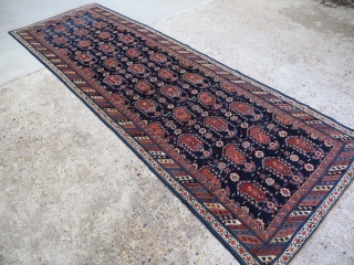 Antique Caucasian Kuba region Shirvan runner, with all over large boteh design. www.knightsantiques.co.uk 
Size: 11ft 6in x 3ft 10in (350 x 118cm). 
Circa 1880. 

The indigo field is filled with large boteh,  ...