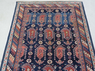 Antique Caucasian Kuba region Shirvan runner, with all over large boteh design. www.knightsantiques.co.uk 
Size: 11ft 6in x 3ft 10in (350 x 118cm). 
Circa 1880. 

The indigo field is filled with large boteh,  ...