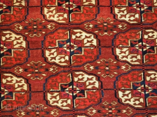 Antique Tekke Turkmen rug of small size with excellent colour. www.knightsantiques.co.uk 
Size: 4ft 8in x 3ft 7in (142 x 108cm).
Circa 1880.

The rug has three rows of seven Tekke guls, these are will  ...