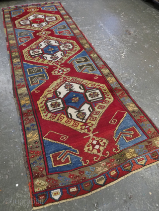 Antique Turkish Konya region, Karapinar village long rug / runner of classic triple medallion design.
Circa 1900. Size: 12ft 0in x 4ft 0in (365 x 121cm).
A good example of a Karapinar village long ...