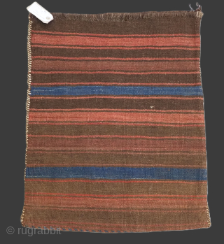 Size: 2ft 6in x 2ft 0in (75 x 60cm).

Antique Baluch storage bag with weft work design.

Circa 1900.

This fine storage bag (possibly once 1/2 of a pair of saddle bags), is by the  ...