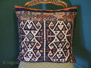 Antique saddle bag kilim cushion, the cushion is half of a saddle bag from the Malatya region of Turkey, circa 1900.
The back is the original back of the saddle bag with interesting ...