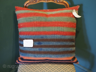 Antique saddle bag kilim cushion, the cushion is half of a saddle bag from the Malatya region of Turkey, circa 1900.
The back is the original back of the saddle bag with interesting ...