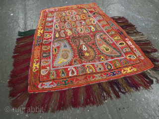 Antique Uzbek Lakai tribal ceremonial horse / saddle cover.
Size: 4ft 0inx 4ft 0in (122 x 123m) excluding tassels.
Circa 1920.

This beautiful embroidered horse / saddle cover was made by the Lakai tribe of  ...