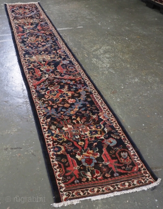 Antique Mahal runner of a very scarce narrow width.
www.knightsantiques.co.uk
Circa 1900.
Size: 14ft 11in x 2ft 5in (455 x 73cm).
The runner has a colourful feel with a classic large scale floral design on a  ...