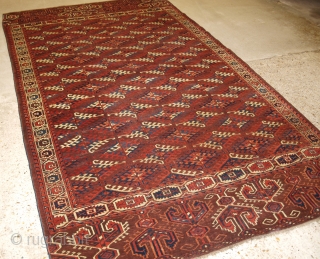 Antique Yomut Turkmen main carpet with the ‘Dyrnak’ gul design and superb large elem panels at both ends. www.knightsantiques.co.uk 

Circa 1850/70.

The carpet has a rich brown ground colour with some very nice  ...