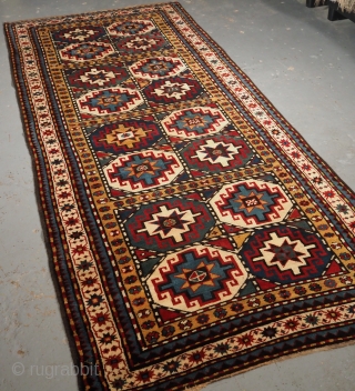 Antique South Caucasian Moghan Kazak long rug with Memling guls within octagons. www.knightsantiques.co.uk 
Size: 9ft 0in x 4ft 0in (275 x 123cm).
Circa 1890.

A superb Kazak long rug with two vertical rows of  ...