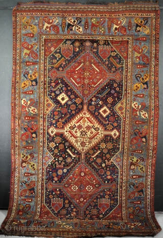 An antique Khamseh carpet very rare and quite beautiful border. Low pile in places with some small moth holes and other damages. Mid 19th century        