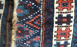 an old Baluch square, with great wool and lots of juicy aubergine dye. Not sure if its a big bag or a rug...? 79x75cm         