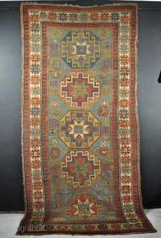 Antique green ground Kazak runner. Worn, a few holes, some fuchine, filthy, but restorable! Crca 1880. 276 x 132cm              