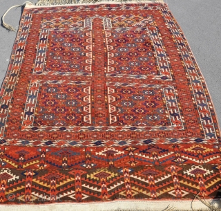 An antique and very colorful Yomud Ensi of fine quality in very good condition for its type. pile just dipping to the collars in one small area, very slightly shaped on one  ...
