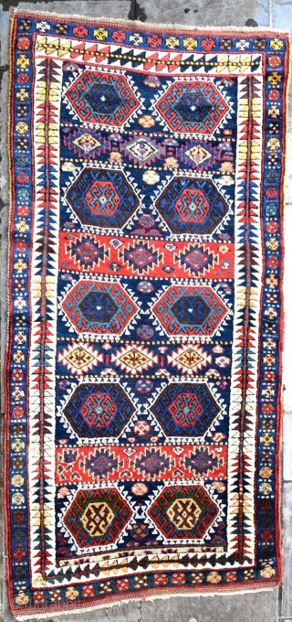 An antique Sinjabi Kurdish rug from North West Persia. A beautiful tribal rug with glowing natural dyes and good wool. Both decorative and collectable, this wonderful old rug is in exceptional condition  ...