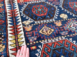 An antique Sinjabi Kurdish rug from North West Persia. A beautiful tribal rug with glowing natural dyes and good wool. Both decorative and collectable, this wonderful old rug is in exceptional condition  ...