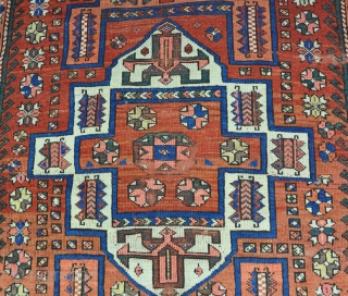 An antique Canacale rug, Bergama. 19th century. Low in places, but quite a lot of pile, fat kilim one end, origanol side cords. Hanging loops to reverse. needs a good wash. 213  ...