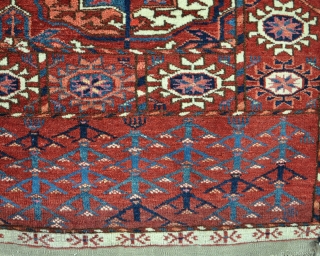 A good Tekke wedding rug with all natural dyes and good wool. The piece is in extraordinary condition, no wear or repair. hanging loops to rear. just needs a bath. circa 1880. 