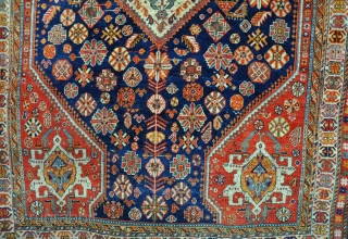 Antique Qasgai with shiney wool and good dyes, slightly low in places, but mostly in very good pile with no repairs. Late 19th century. 223x156cm        