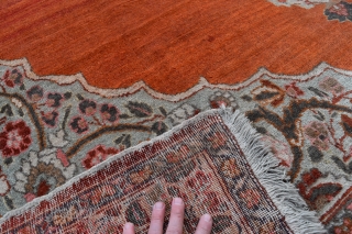 A fine antique Persian Tabriz carpet with soft colours and silky wool. A very clean carpet with even low pile, very slight moth damage here and there, but heavy and solid without  ...