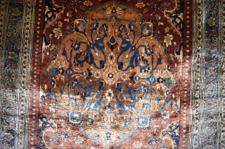 A very Fine antique Heriz Silk rug. A top flight collectable piece woven with beautiful, arabesque filled medallion on soft red ground. The silk on silk rugs are marvels to behold, technically  ...