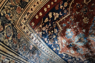 A very Fine antique Heriz Silk rug. A top flight collectable piece woven with beautiful, arabesque filled medallion on soft red ground. The silk on silk rugs are marvels to behold, technically  ...