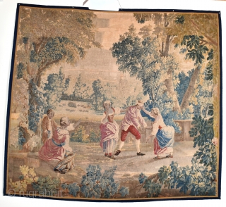 A good antique French tapestry fragment. Finely made with figures playing blind mans bluff. Good all-over condition, professionally cleaned, conserved and backed onto linin. Super decorative example of useful size with minimal  ...