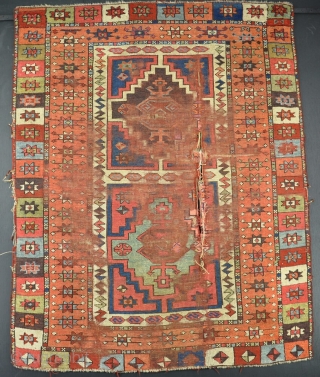 A good and very unusual east Anatolian Kurdish rug of excelent quality, with very clear dyes and strong graphics, filthy, worn and holed - alas poor yoruk.....! Very fresh to the market  ...