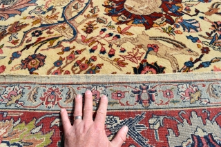 An Old Persian Tabriz carpet of Benlyan type. A highly decorative item with all-over palmetes and hunting animals woven in muted dyes on soft ivory ground. The piece is in excellent, original  ...