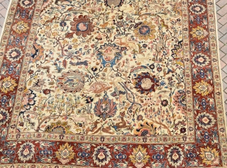 An Old Persian Tabriz carpet of Benlyan type. A highly decorative item with all-over palmetes and hunting animals woven in muted dyes on soft ivory ground. The piece is in excellent, original  ...