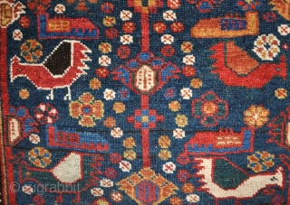 An antique Afshar rug, unusual with the chicken design more usually associated with Khamseh work. All good dyes in good, original condition, with kilim ends and no repair. Images taken indoors with  ...