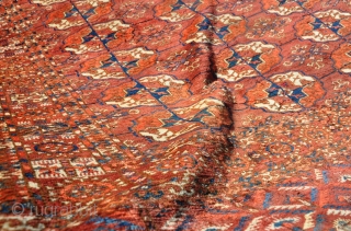 A super fine Tekke wedding rug, very good dyes and great wool, some silk highlights. Decent pile but with some moth damage that has made trails and some little holes in places.Sides  ...