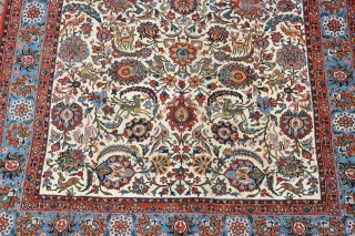 An old Qum carpet with soft dyes in near perfect condition. First quarter 20th century.348x231cm                  
