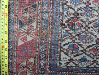 An exceptionally fine Shirvan prayer rug, woven on silk wefts. a little wear, s tear to left border, tatty around edges, one or two small faded repairs, needs a good wash. The  ...