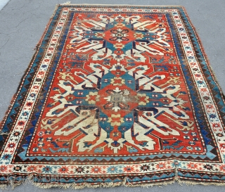 A good antique Eagle (Chelebered) Kazak rug with natural dyes and crisp drawing. worn,dirty, but untouched with its ends and sides, so suitable for a restorer. 19th century,     